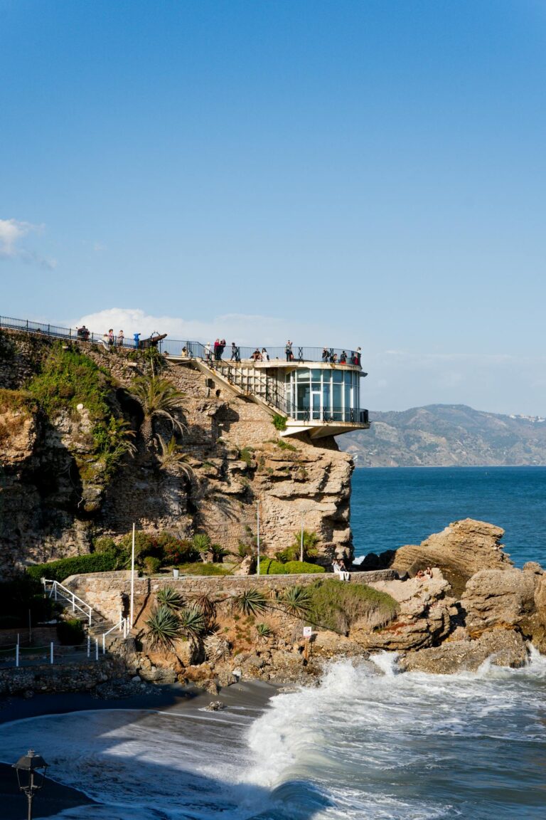 Explore the stunning coastal landscape from Balcon de Europa in Nerja, Spain.